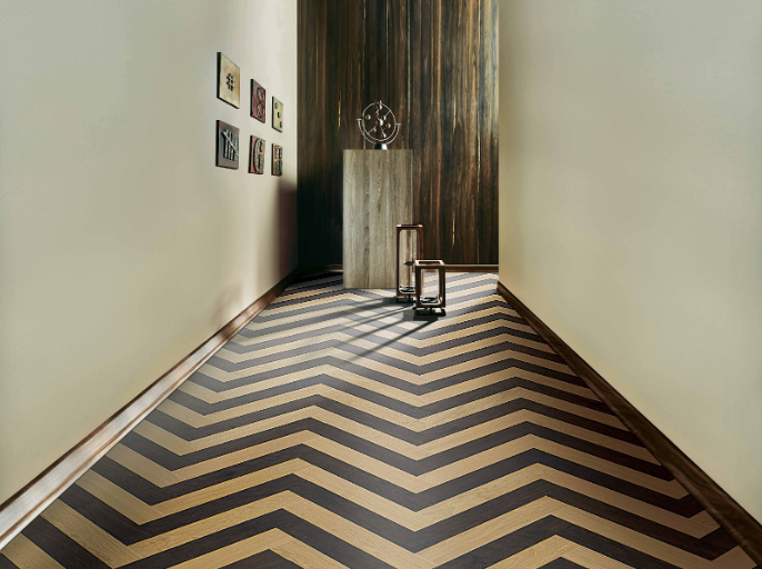 Herringbone wooden flooring design for living room by Mikasa Floors