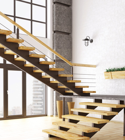 L-shaped staircase with landing in a luxury home by Mikasa Floors