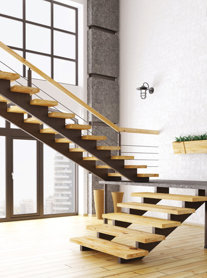 L-shaped staircase with landing in a luxury home by Mikasa Floors